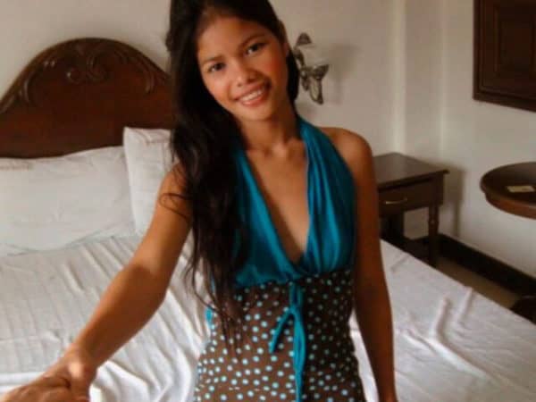 Beautiful Filipino Girls like Anabel sitting in bed joyfully are the best