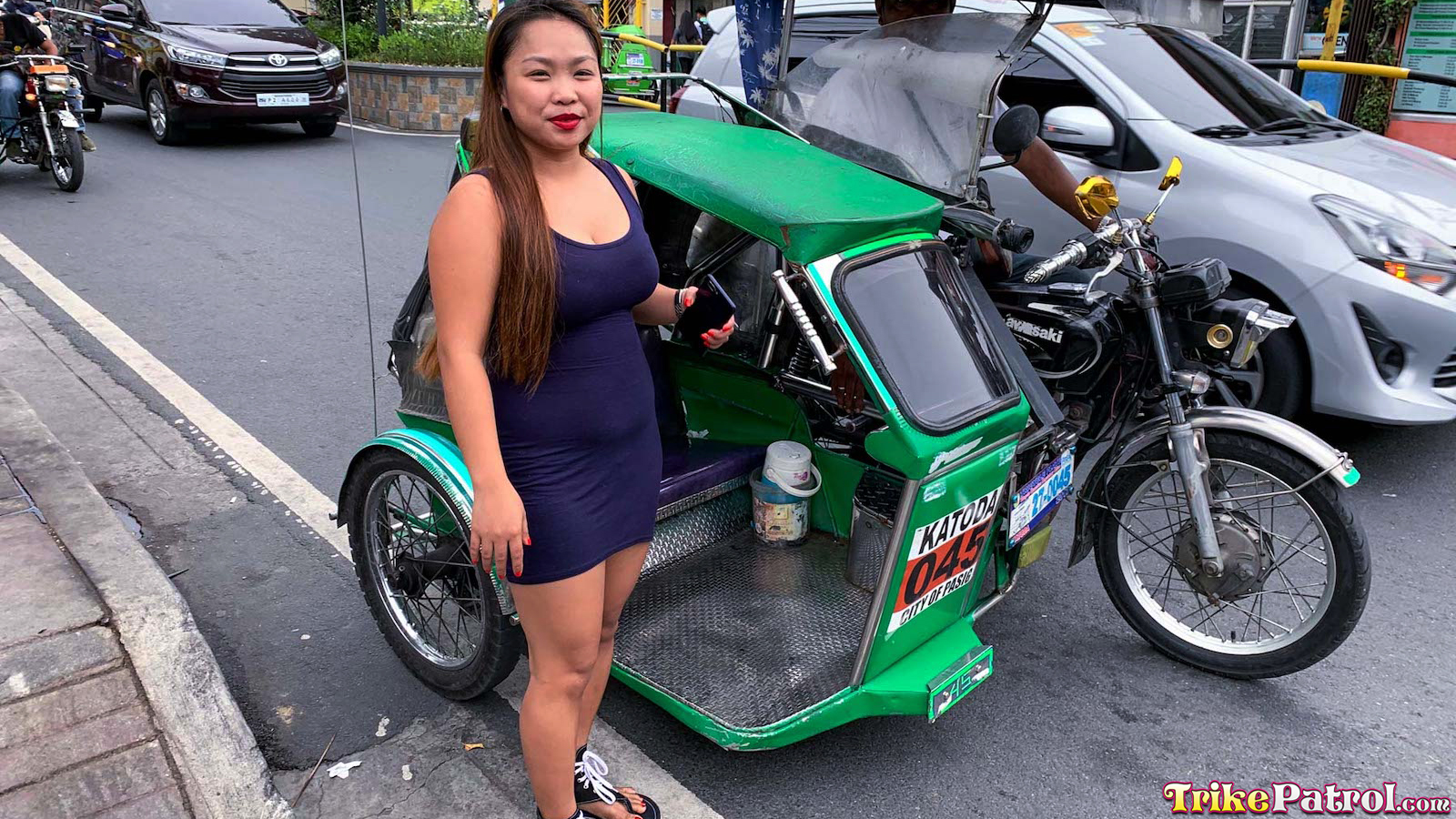 Jessica flagged down a trike for the ride to the hotel