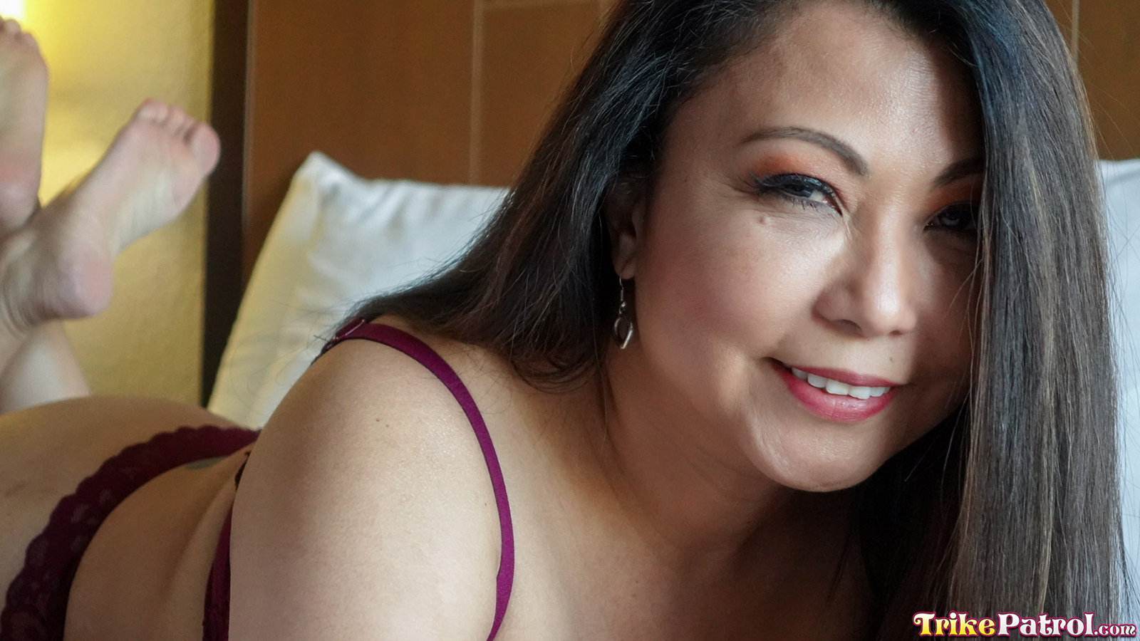 Sexy milf smiles for the camera at trikepatrol.com