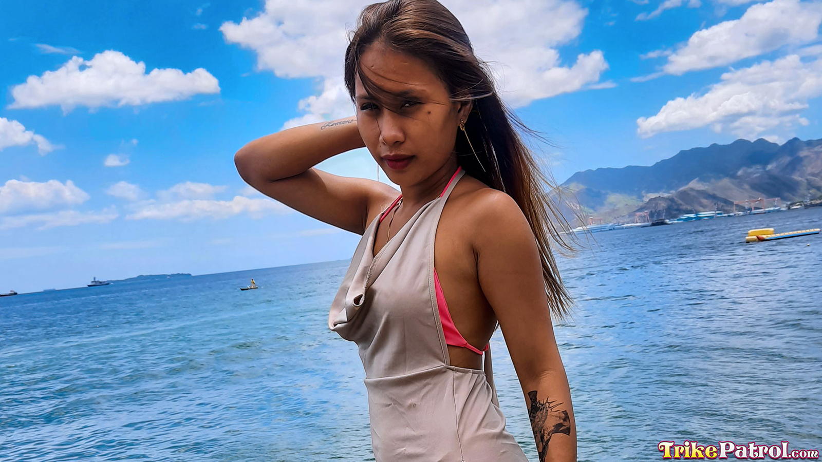 Sexual brunette takes a walkabout on a Philippine beach