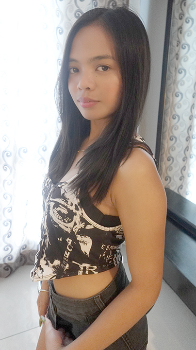 Slender and cute Filipina Trike Patrol Megan Agbayani poses for camera